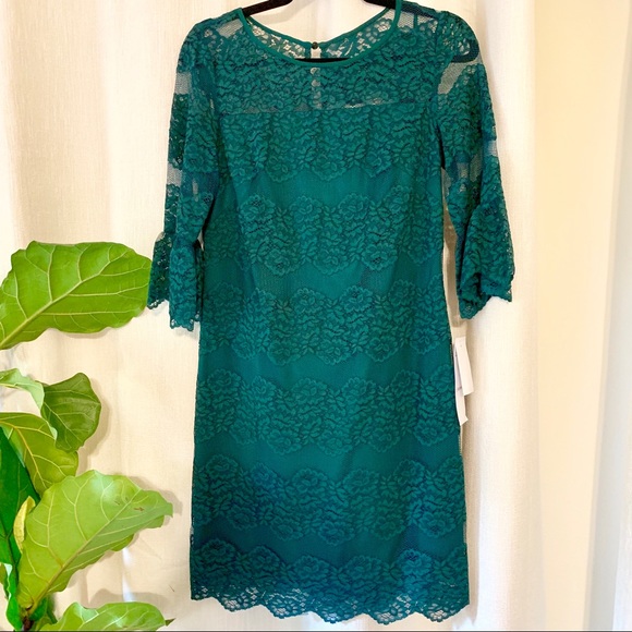R&K Dresses & Skirts - NWT Beautiful green lace dress with bell sleeves.
